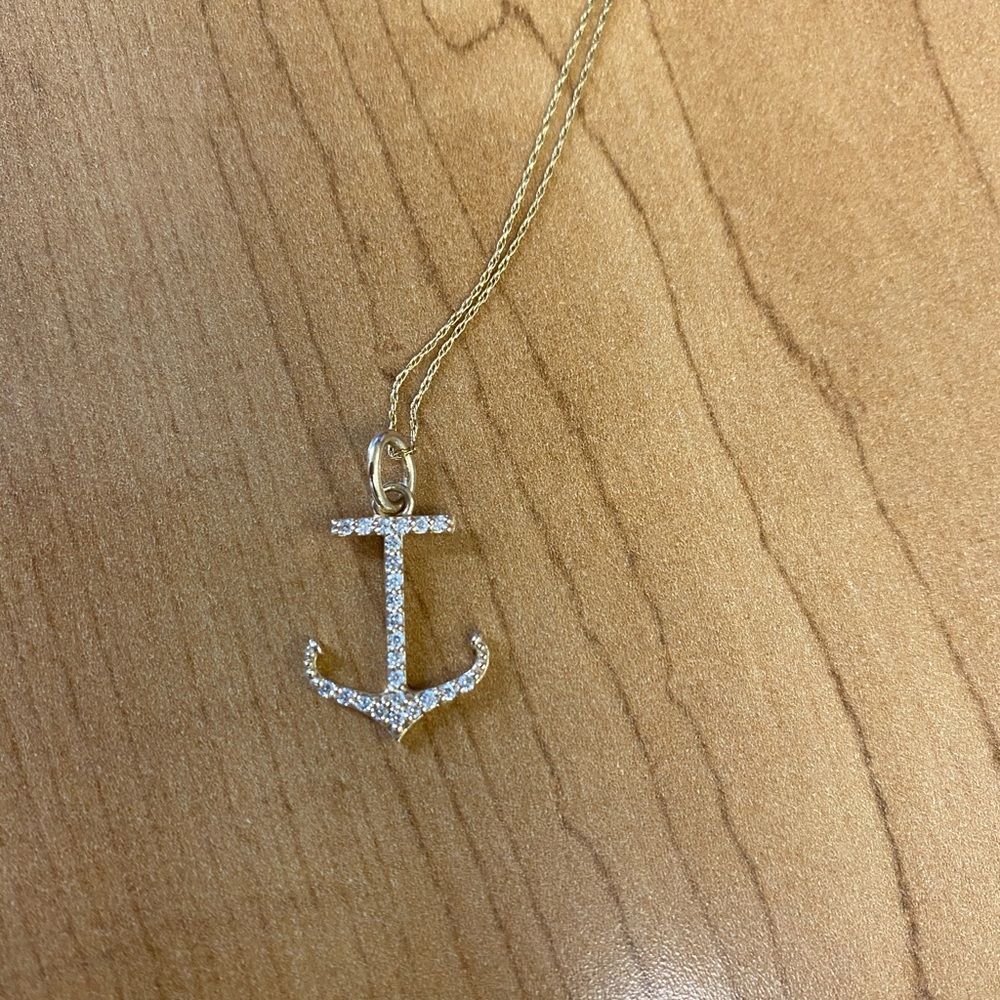 14k gold and diamond Anchor pendant with chain.